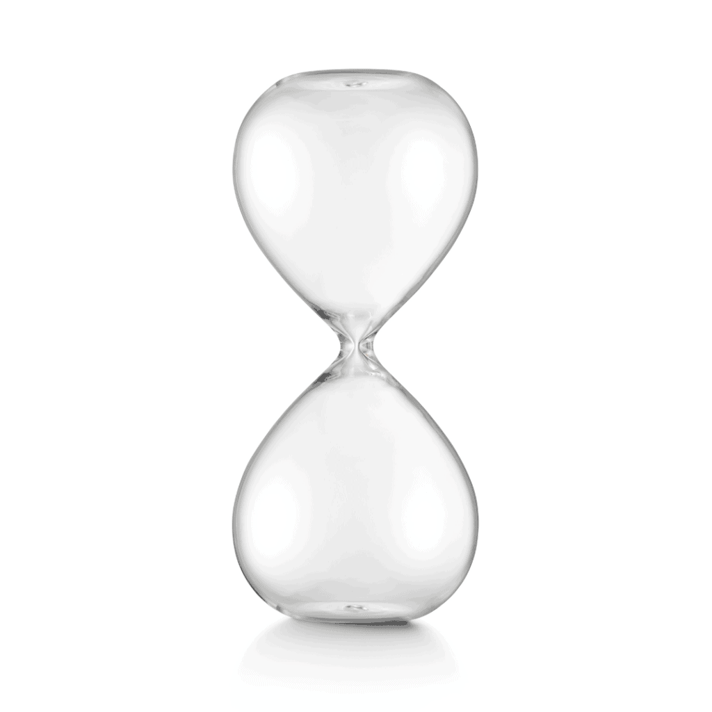 A clear, empty hourglass with no sand inside, symbolizing stillness, pause, and the spaciousness of unfilled or empty time.