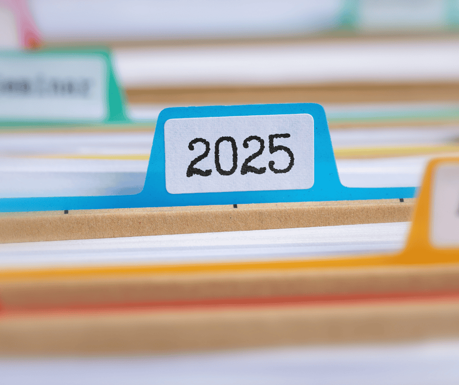 A set of files and file folders with one of them featuring the text 2025 on a folder tag, as if in a file cabinet.