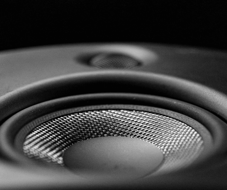 Close-up of a speaker cone symbolizing the subtle rhythm and resonance of focused attention.