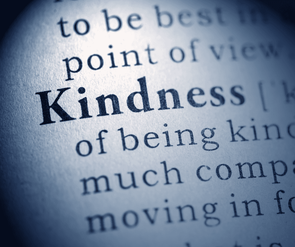 Close-up of the word “Kindness” highlighted in a dictionary definition, symbolizing the productivity of small, intentional acts.